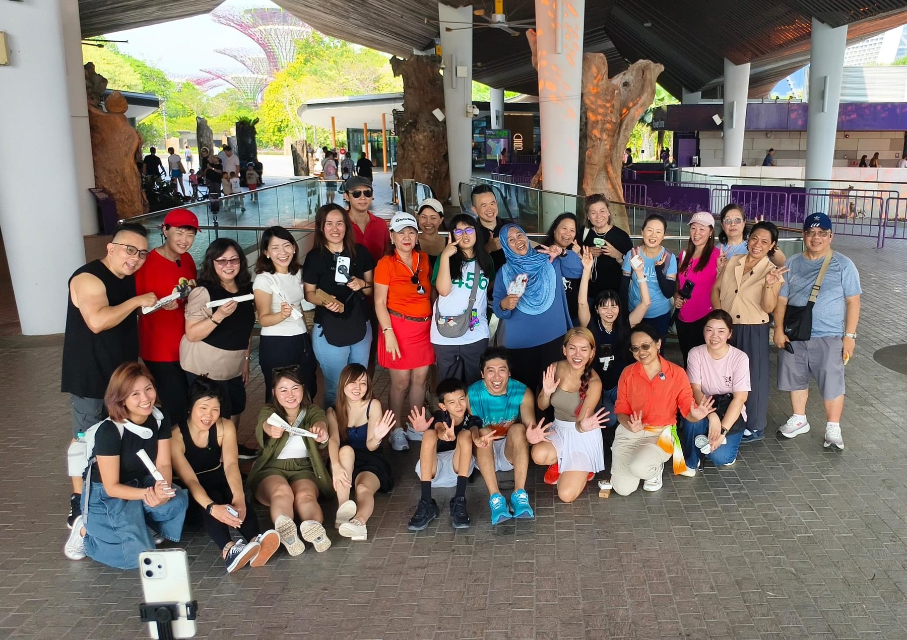 BR Academy learners gathered outdoors for a group photo after a community event