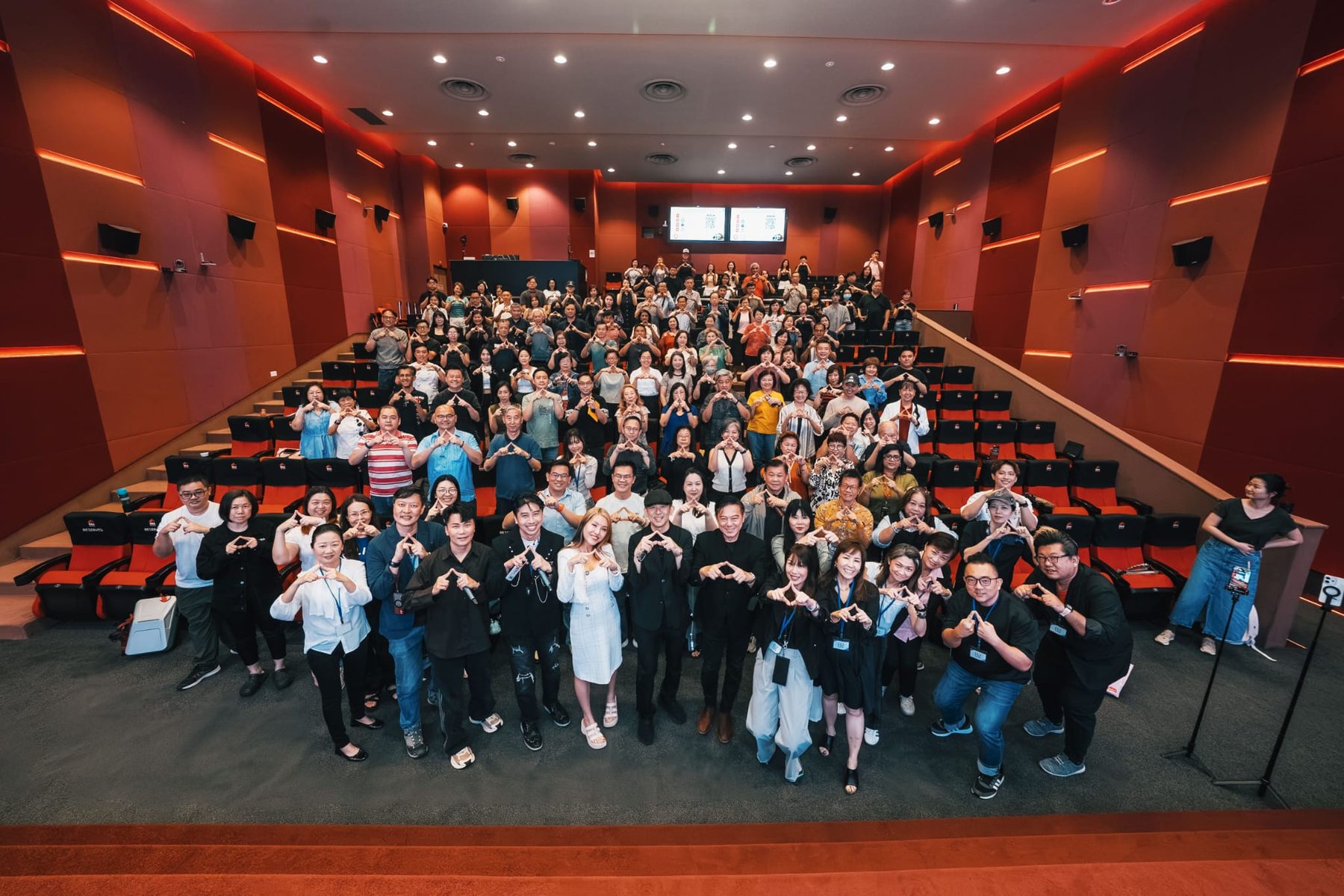 A packed lecture theatre of BR Academy learners and trainers celebrating the end of a class