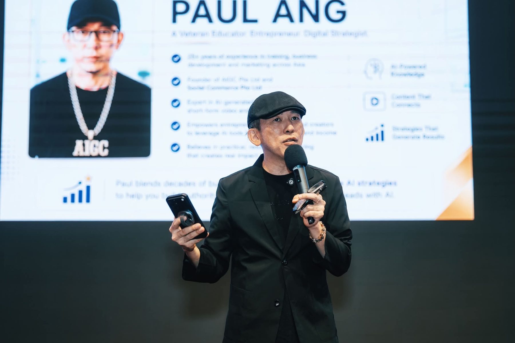Paul Ang speaking on stage at a BR Academy event
